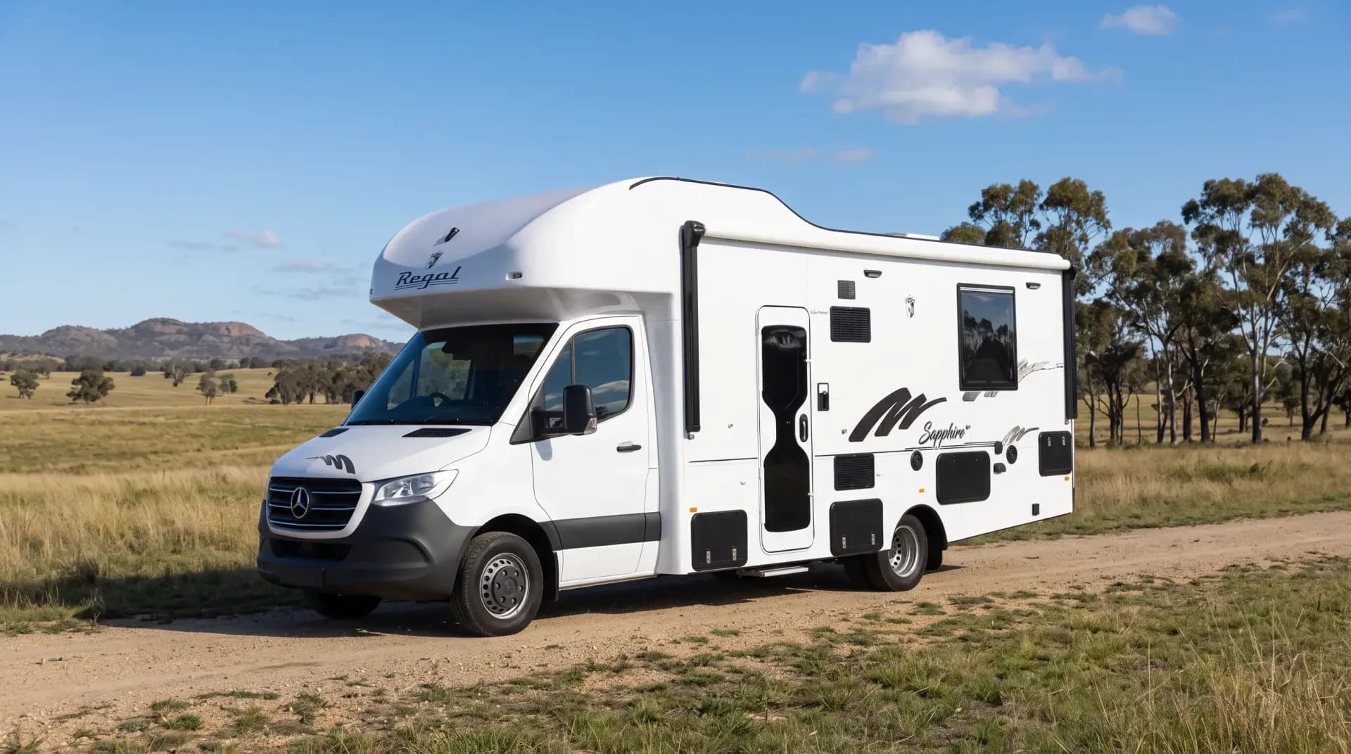 Regal Sapphire motorhome on a country road